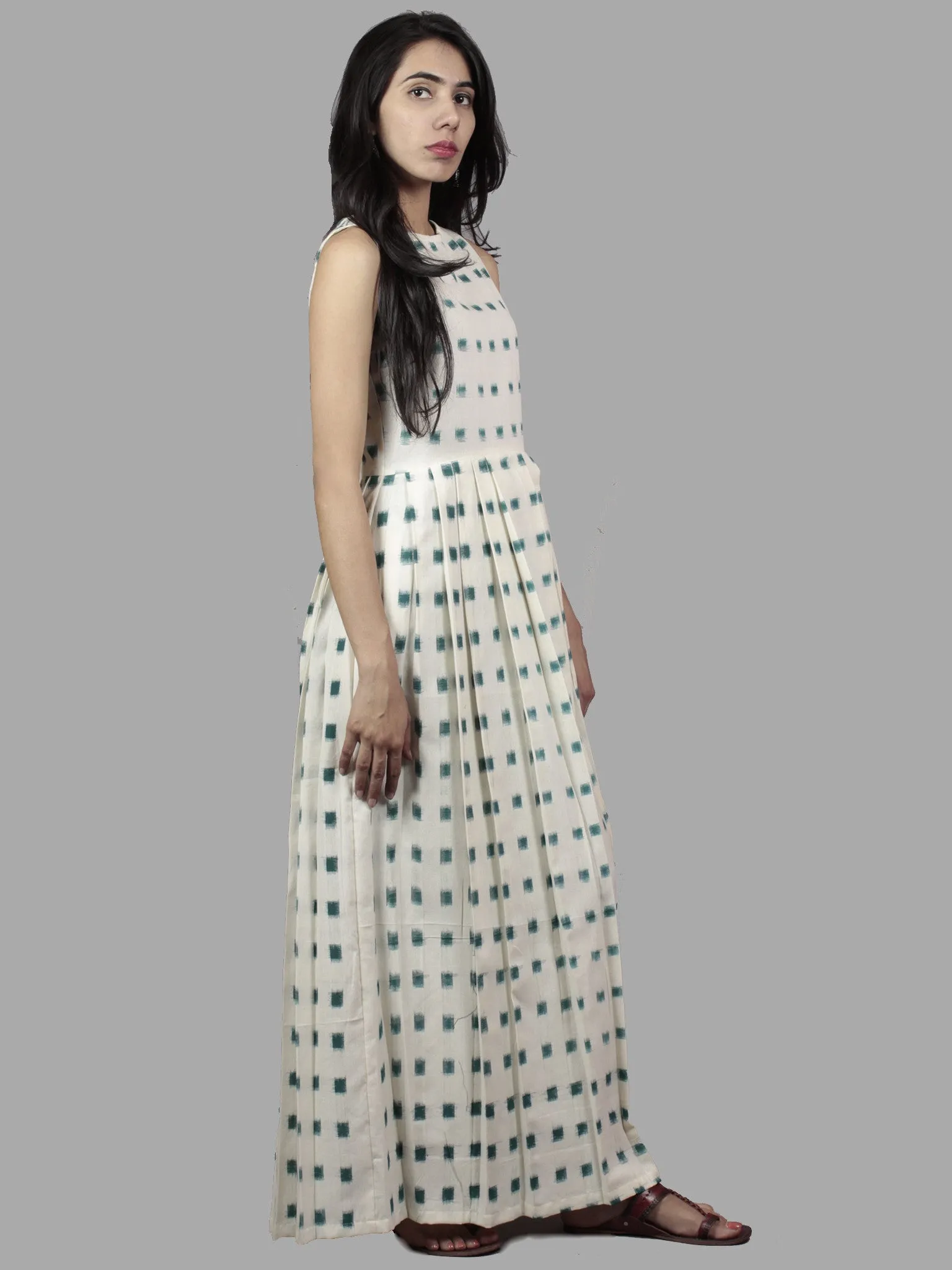 Ivory Pine Green Long Sleeveless Handwoven Double Ikat Dress With Knife Pleats & Side Pockets - D3265605