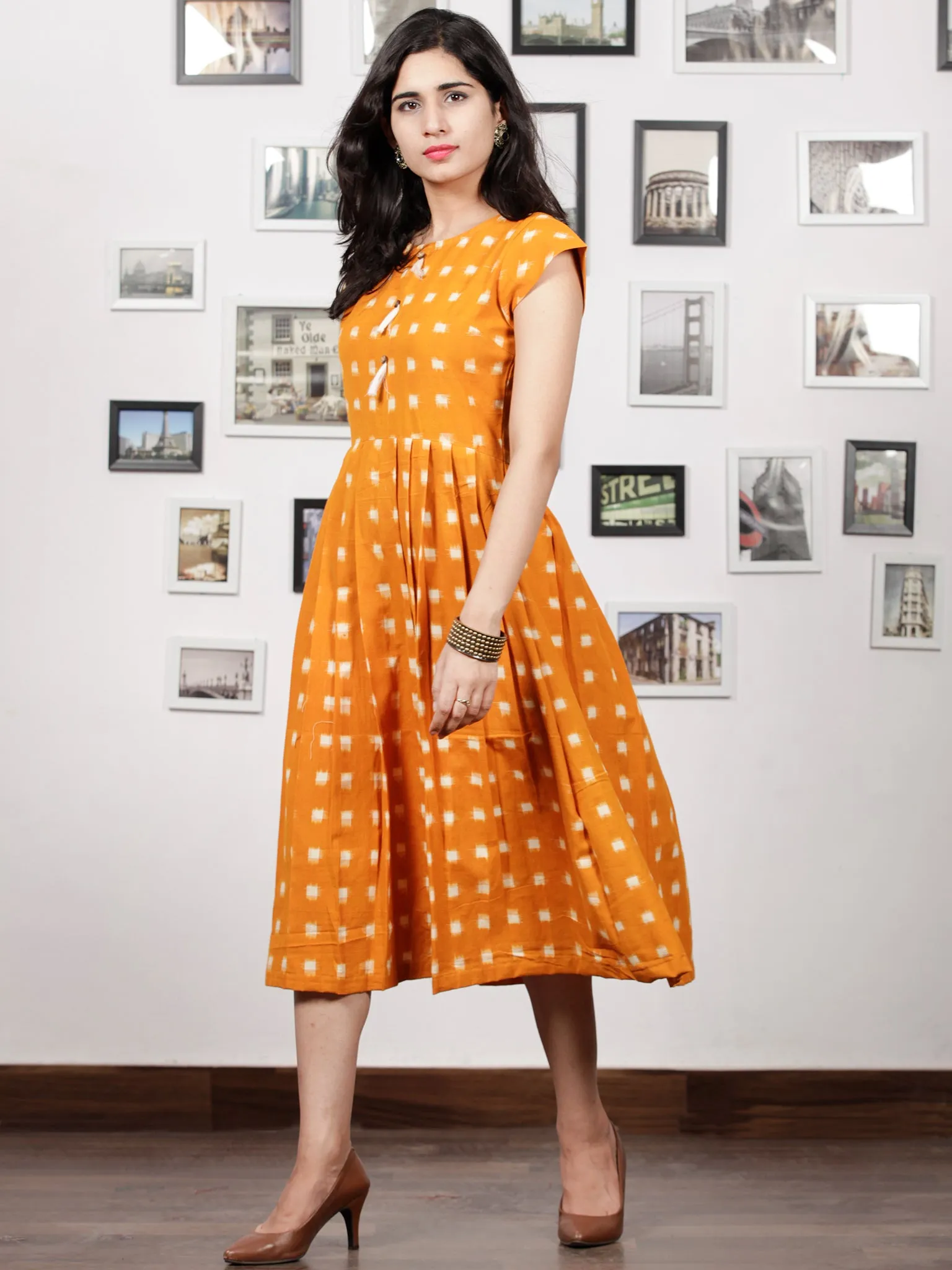 Mustard Ivory Handwoven Double Ikat Pleated Dress With Side Pockets & Tassels - D65F1019